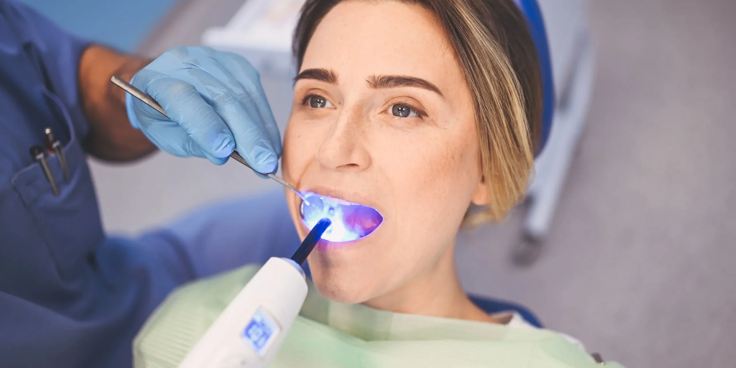 Pregnant woman getting dental fillings Pregnant woman getting dental fillings