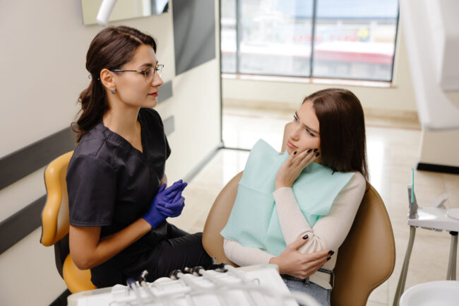 Woman at the dentist for tooth fillings