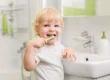 A child brushing baby teeth