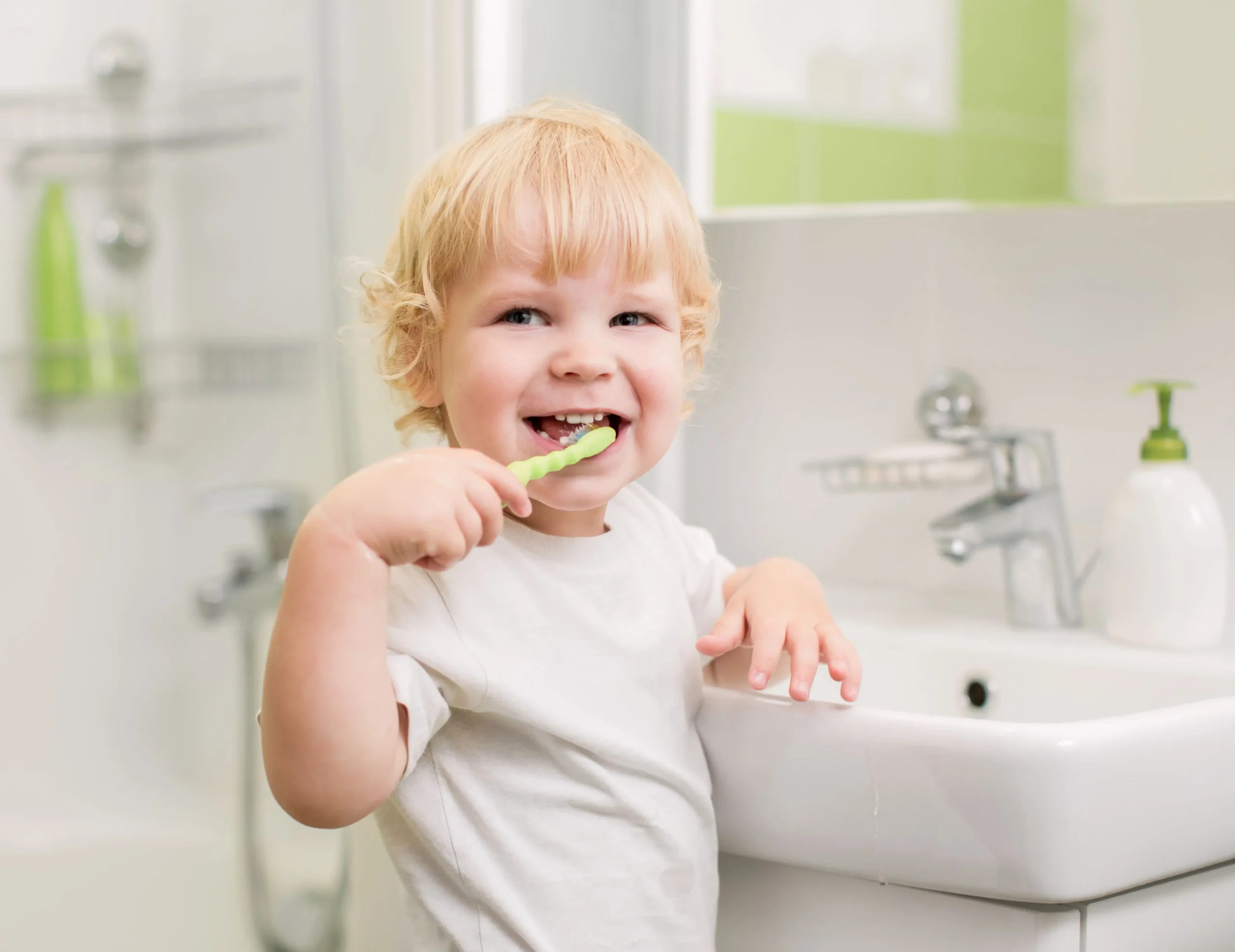 A child brushing baby teeth